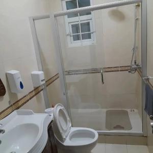 Ванная комната в MASAKI SEA VIEW APARTMENT