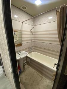 Koupelna v ubytování Ганга центр люкс