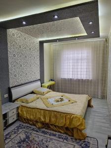 Postel nebo postele na pokoji v ubytování Ганга центр люкс