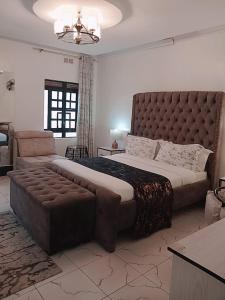 Легло или легла в стая в Cacecy Luxury Homes 2 -Bedroom