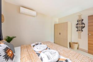 Postel nebo postele na pokoji v ubytování Maya Resort Samui - Family resort-Sha Plus Extra