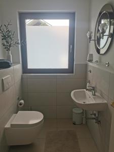 Een badkamer bij Apartment Messe Hannover