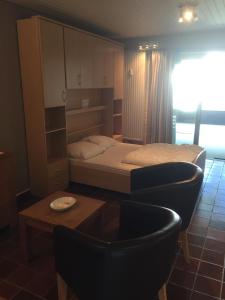 Ένα ή περισσότερα κρεβάτια σε δωμάτιο στο Apartment Acacia 105 +3 φωτογραφίες