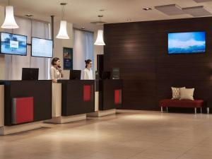 The lobby or reception area at Novotel Athens