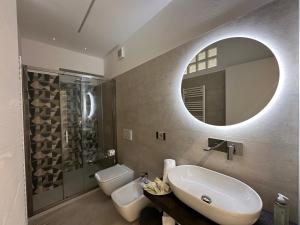 Koupelna v ubytování B&B Perla sul mare + 37 fotografií