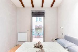 A bed or beds in a room at Loft 33