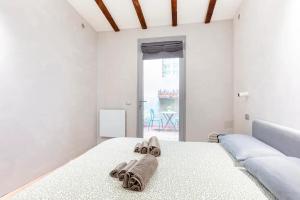 A bed or beds in a room at Loft 33