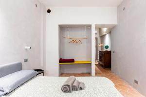 A bed or beds in a room at Loft 33