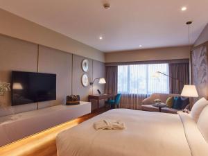 Postel nebo postele na pokoji v ubytování Manto Hotel Lima - MGallery Collection