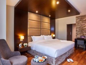 Postel nebo postele na pokoji v ubytování Manto Hotel Lima - MGallery Collection