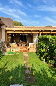 パラーウにあるCasa Di Gio - Sardinia - Porto Mannuの家のパティオ(テーブル、椅子付) +22枚の写真