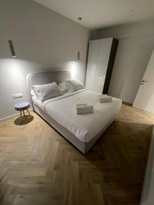 Ένα ή περισσότερα κρεβάτια σε δωμάτιο στο Down Town Nea Smyrni