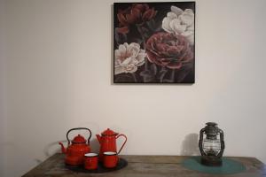 L'Atelier 57 - Votre meublé authentique !的咖啡和沏茶工具