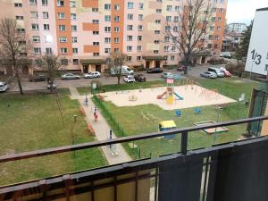 a view of a park with a playground at Apartament Sol in Radom