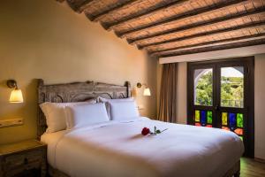 Ein Bett oder Betten in einem Zimmer der Unterkunft Dar Echchaouen Maison d'Hôtes & Riad