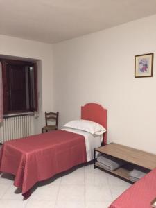 Postel nebo postele na pokoji v ubytování Foresto Case Vacanza