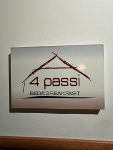uma placa que diz bassel bed and breakfast em A 4 PASSI em Reggio di Calabria