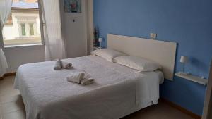 Postel nebo postele na pokoji v ubytování Hotel Canarco