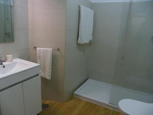 Koupelna v ubytování Lagoa Hostel & Suites