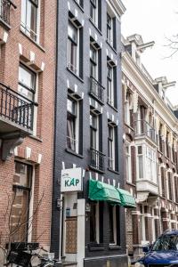 a building with a kap sign in front of it at Hotel Kap City Centre in Amsterdam