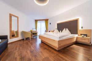 Postel nebo postele na pokoji v ubytování Hotel Meinhardt