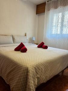 Posteľ alebo postele v izbe v ubytovaní Apartamento Rivas