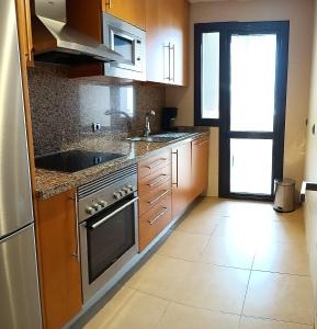 Kuchyň nebo kuchyňský kout v ubytování Lovely apartment with pool & sea views - Marina Del Castillo 2129