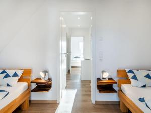 Katil atau katil-katil dalam bilik di Nitschke - vakantiewoning Watt