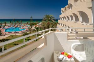 a view of the beach from the balcony of a resort at Vincci Helya Beach in Monastir