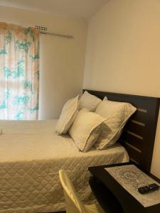 Postel nebo postele na pokoji v ubytování Sunset Guesthouse - Mthatha