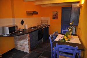 A kitchen or kitchenette at Cà dei Conti