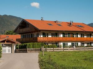 a large house with an orange roof at Castle view Modern retreat in Oberhof