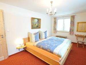 a bedroom with a large bed in a room at Haus Steiner Modern retreat in Oberstdorf