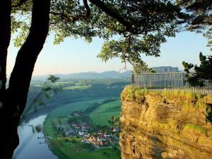 a view of a town on the side of a cliff at Holiday apartments Ender in Sebnitz