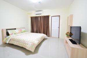 Giường trong phòng chung tại 42 Place