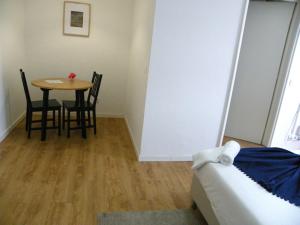Postel nebo postele na pokoji v ubytování Lagoa Hostel & Suites