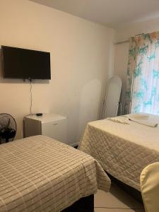 Postel nebo postele na pokoji v ubytování Sunset Guesthouse - Mthatha