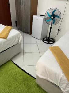 Postel nebo postele na pokoji v ubytování Sunset Guesthouse - Mthatha
