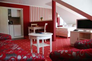 Kuchyň nebo kuchyňský kout v ubytování Hotel Godewind