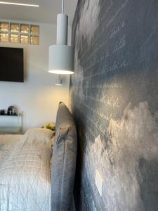 Postel nebo postele na pokoji v ubytování B&B Perla sul mare