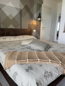 Postel nebo postele na pokoji v ubytování B&B Perla sul mare