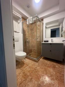 Ένα μπάνιο στο Wish Suites Bodrum Hotel +77 φωτογραφίες