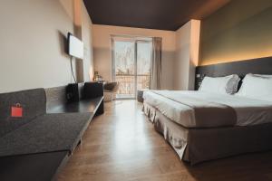 Postel nebo postele na pokoji v ubytování Mod 05 Bike Hotel