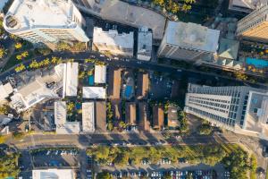 an aerial view of a city with buildings at Waikiki Heritage Hotel in Honolulu