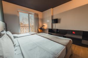 Postel nebo postele na pokoji v ubytování Mod 05 Bike Hotel
