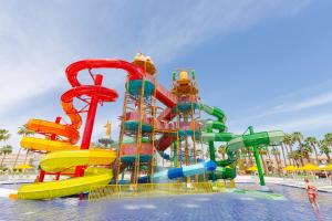 a water park with a colorful water slide at Beach Albatros The Club - Aqua Park in Hurghada