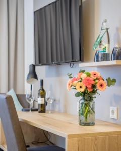 TV a/nebo společenská místnost v ubytování Hotel Lehn