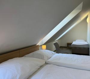Postel nebo postele na pokoji v ubytování Resort Vila Credo