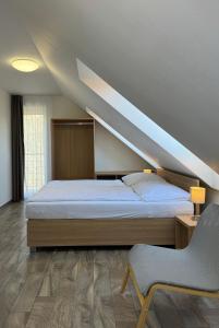 Postel nebo postele na pokoji v ubytování Resort Vila Credo