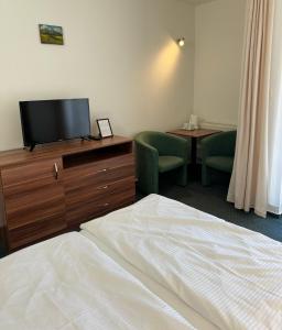 TV a/nebo společenská místnost v ubytování Resort Vila Credo